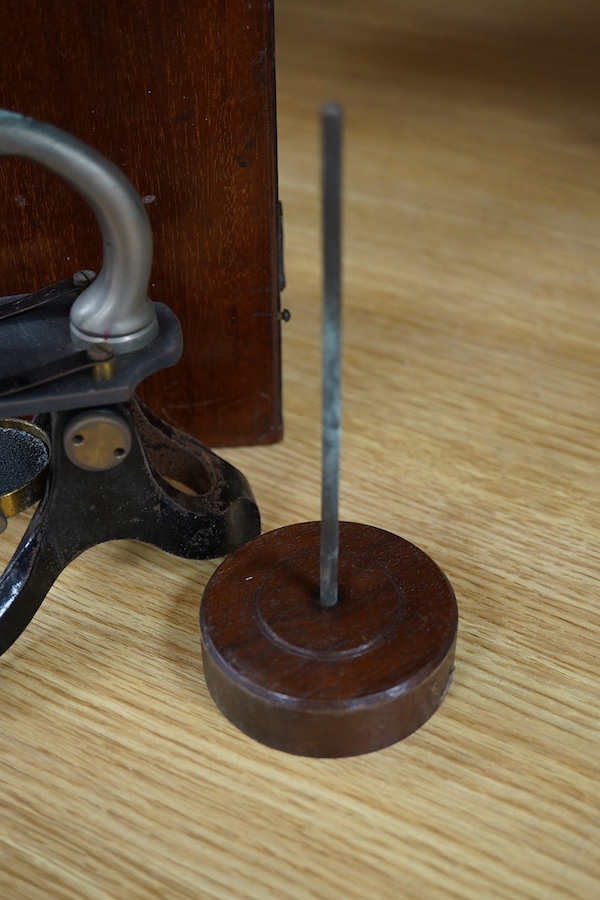 A small mahogany cased microscope, microscope 24cm high. Condition - case good microscope well used